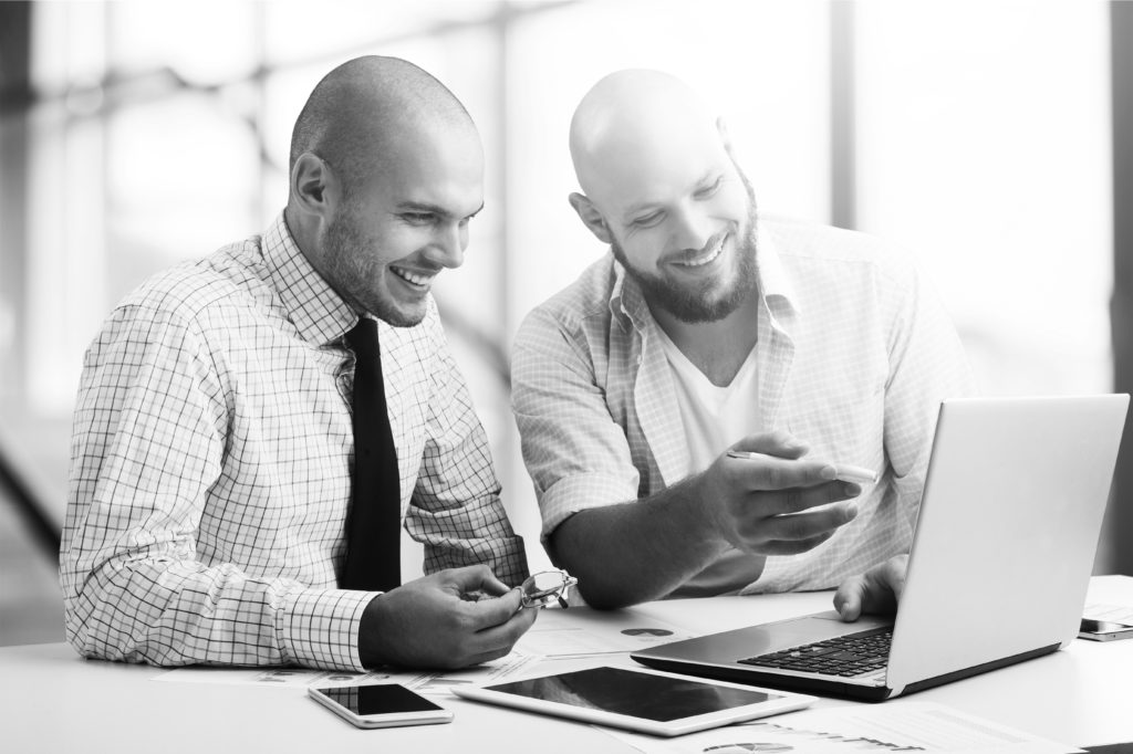 shutterstock_1092928487 professional consultants working in office