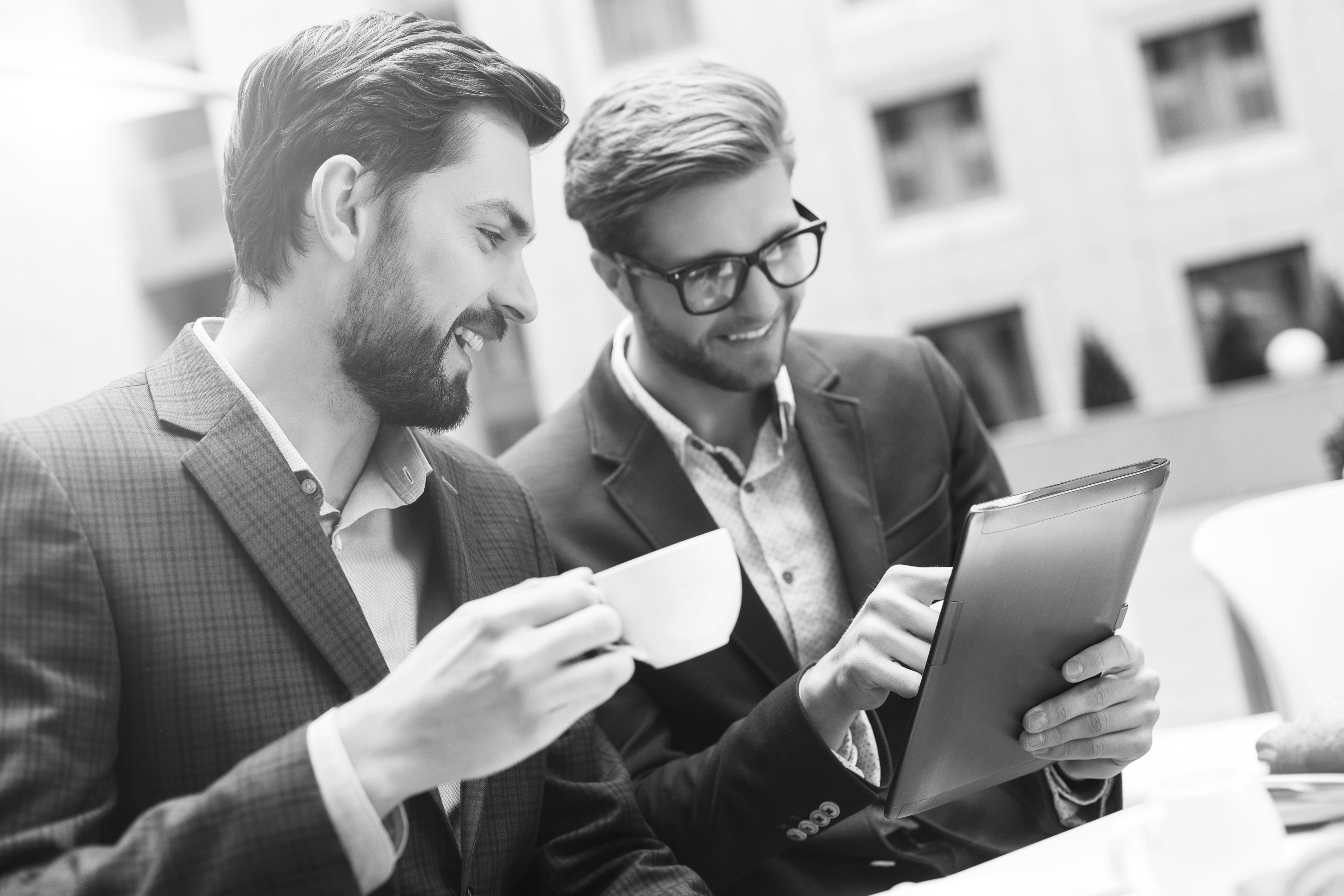 consultants working drinking coffee