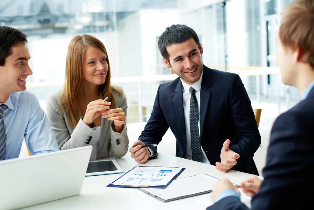 consultant talking to coworkers