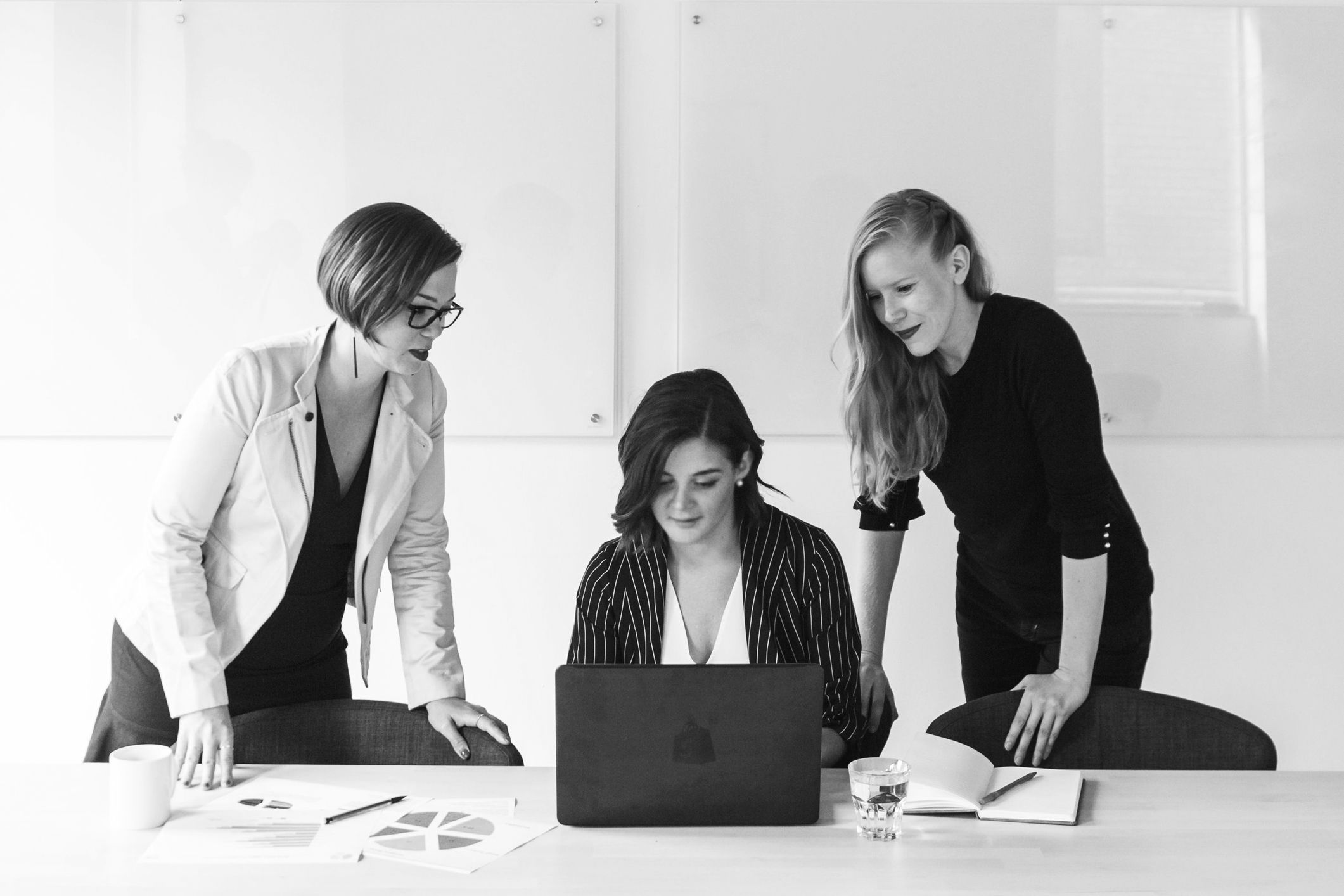 consultants in group working at desk