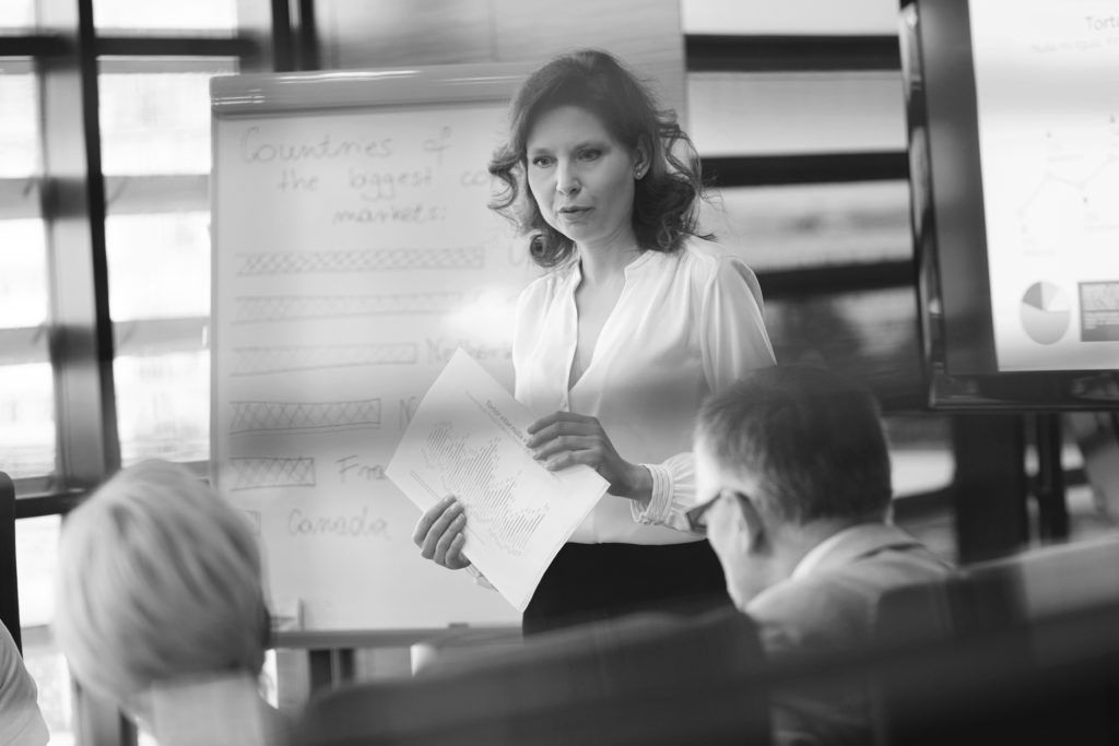 shutterstock_633371009 woman making presentation