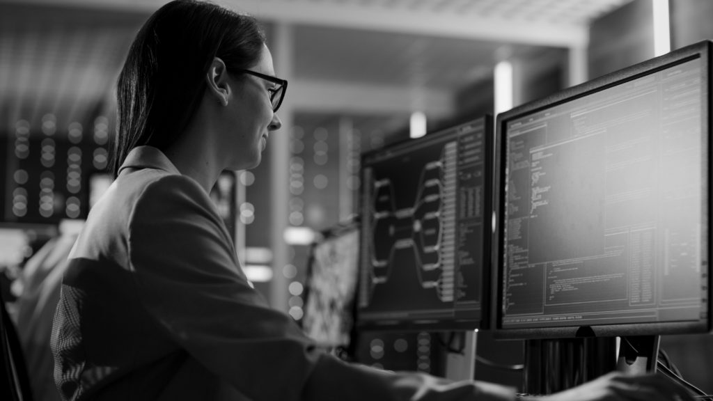 shutterstock_669226057-bw woman working on computer