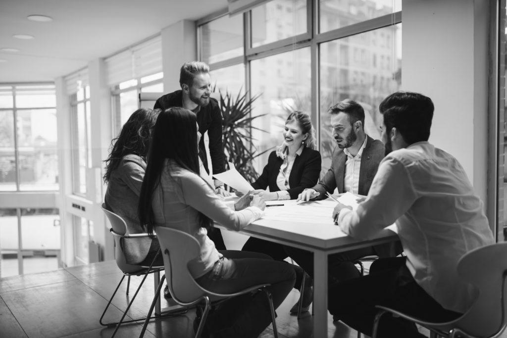 images of people talking inside the office