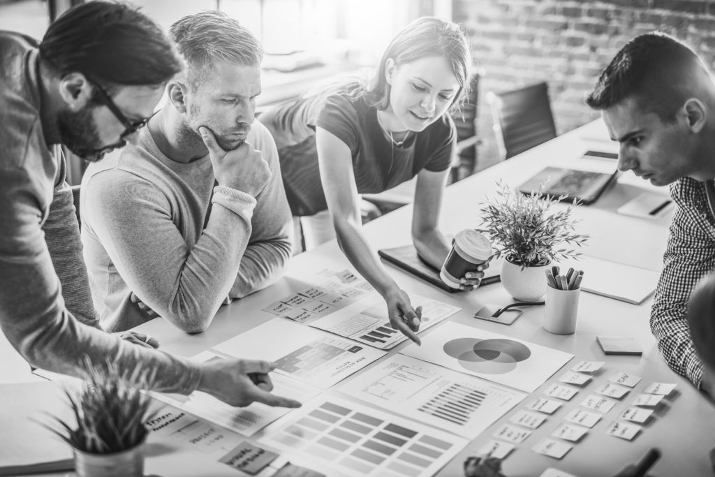 group of professional consultants working in office