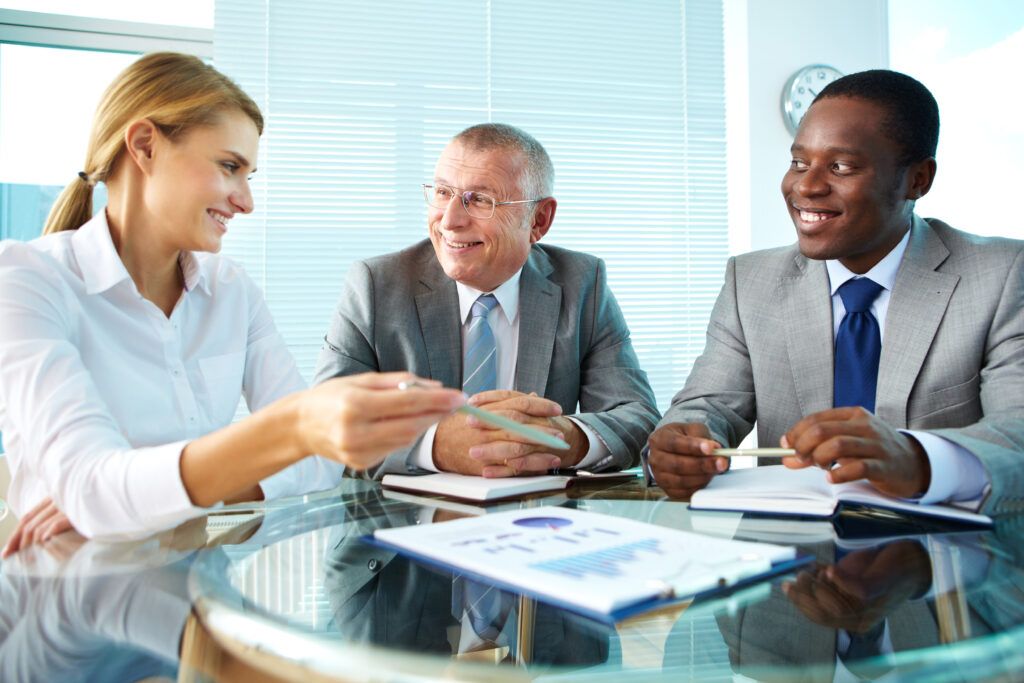 Portrait,Of,Pretty,Secretary,Pointing,At,Paper,While,Explaining,Something consultant