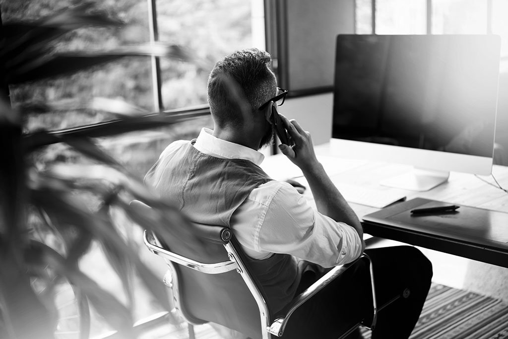 shutterstock_489283825 man talking on phone