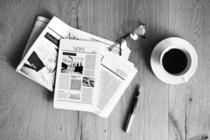 newspapers and coffee