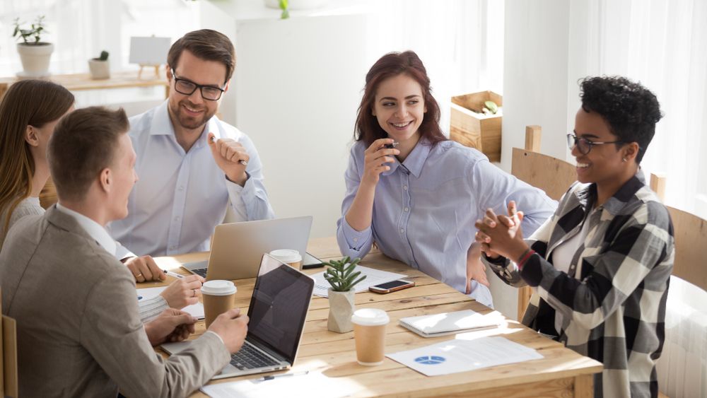 Happy,Mixed,Race,Office,Workers,At,Business,Meeting,Having,Fun.