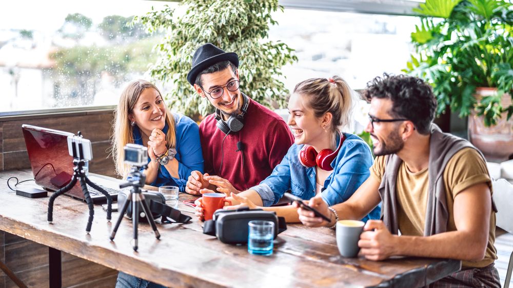 Digital,Native,Friends,Sharing,Feed,On,Streaming,Platform,With,Phone content creators