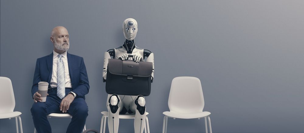 Robot and man sitting together