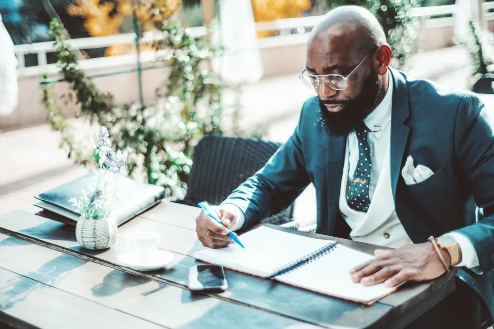 A,Black,Executive,Man,With,A,Beard,Sitting,On,An A,Black,Executive,Man,With,A,Beard,Sitting,On,An