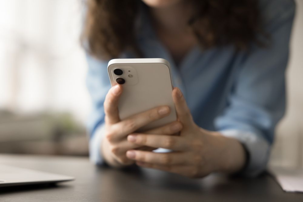 Woman with smartphone in hands