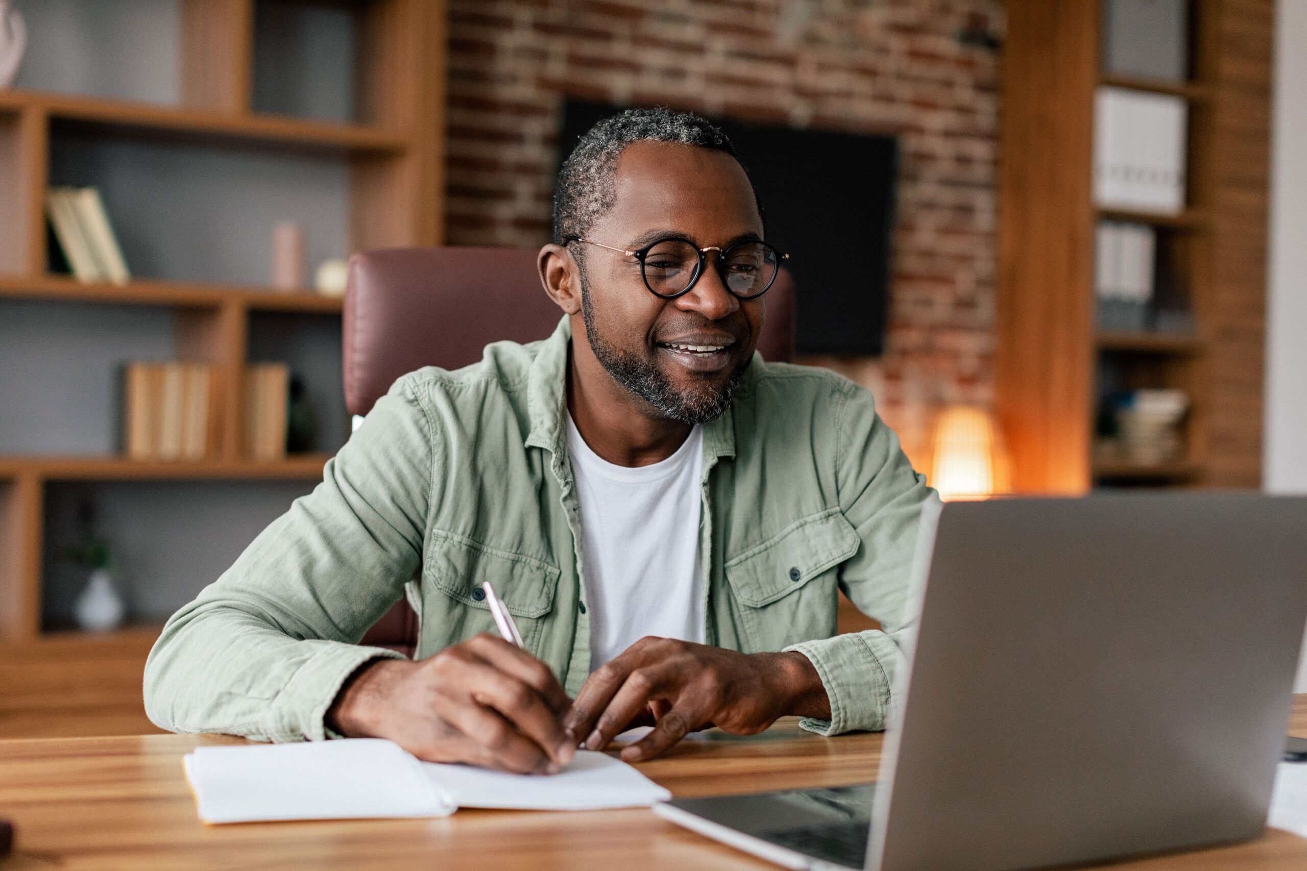 man looking at computer