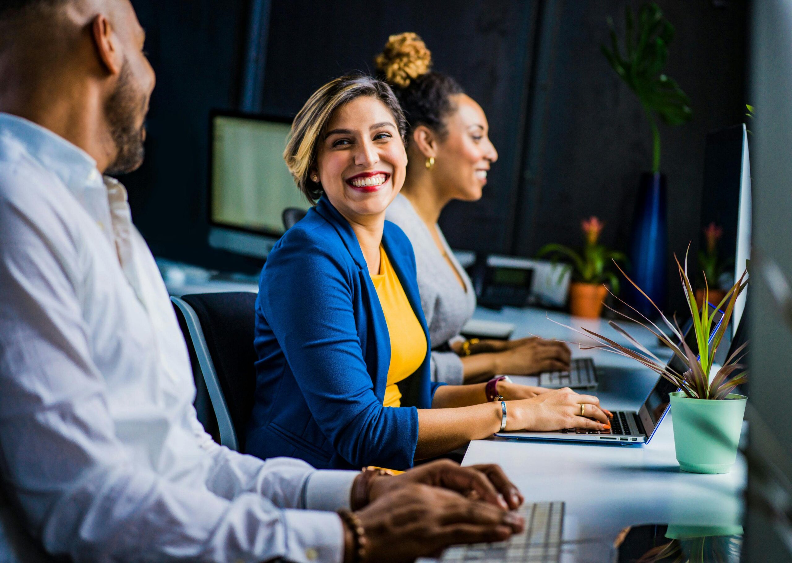 office worker smiling at colleague